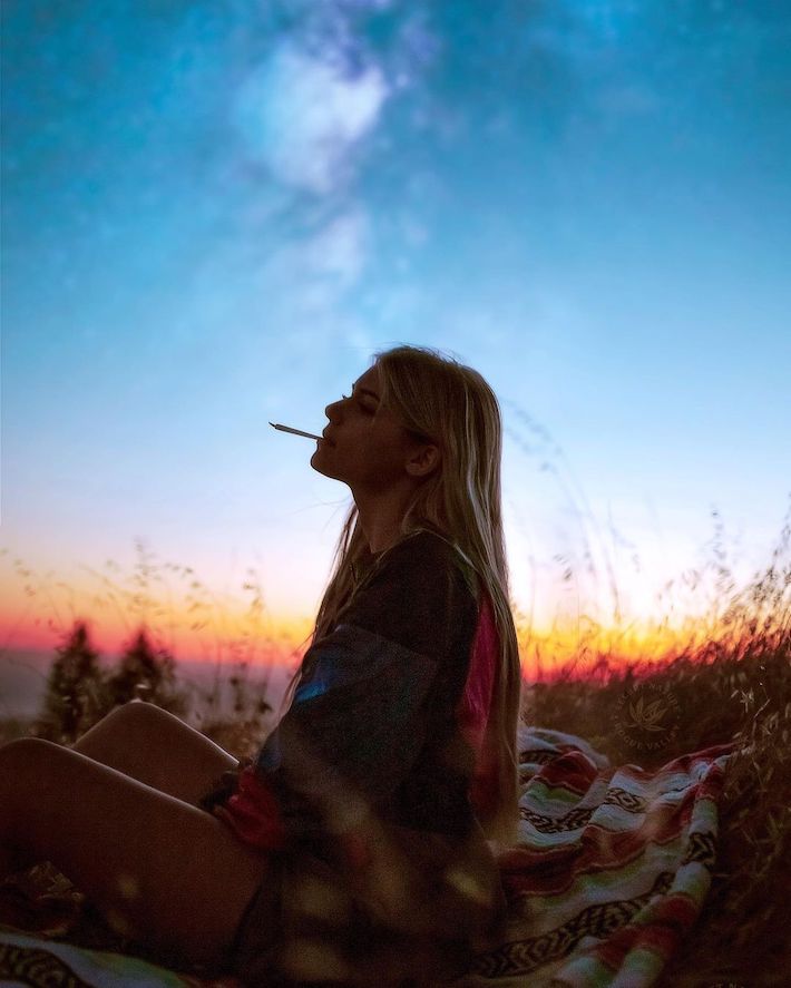 Woman smoking CBD hemp joint